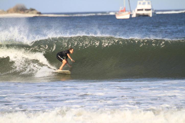 Surfing the waves in Tamarindo